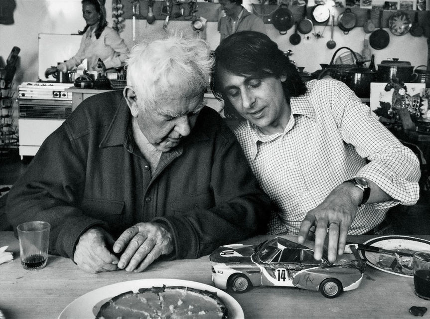 Hervé Poulain and Alexander Calder with a miniature of the first BMW Art Car.